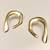 Gold-toned abstract arch stud earrings, anti-tarnish