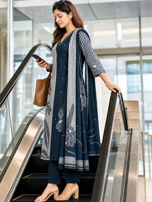 women floral printed regular  cotton kurta with trousers & with dupatta 4