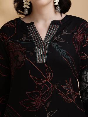 women floral printed regular sequinned a-line kurta with palazzos 6
