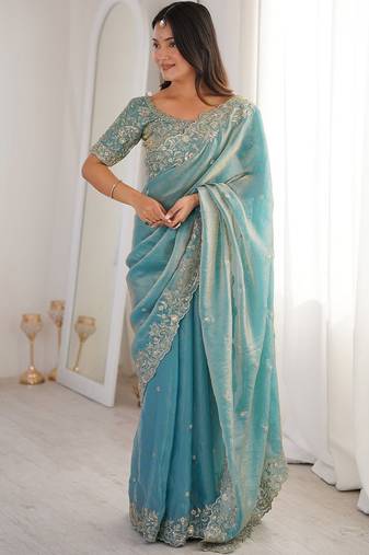 Turquoise embellished embroidered satin heavy work saree