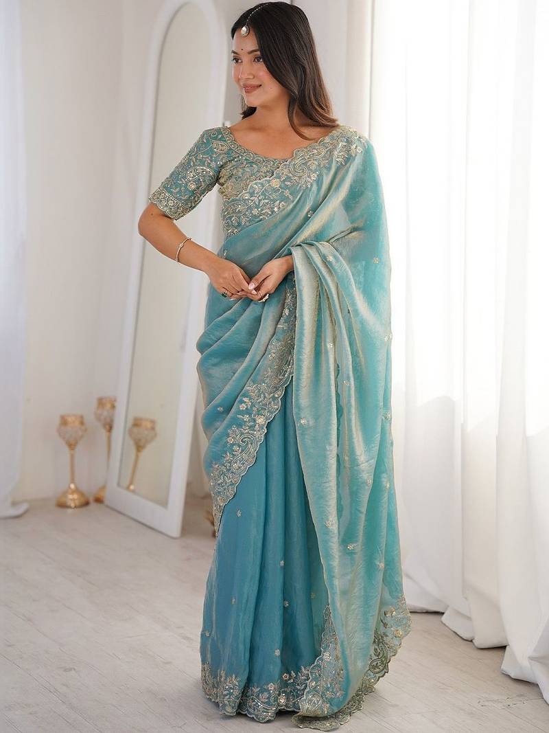 Turquoise embellished embroidered satin heavy work saree