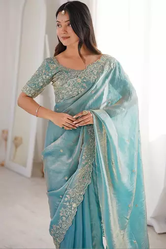 Turquoise embellished embroidered satin heavy work saree