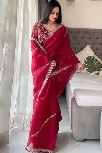 Maroon floral embroidered organza saree