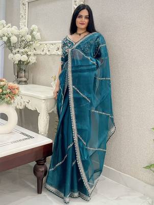 Teal floral embroidered organza saree 1