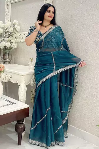 Teal floral embroidered organza saree