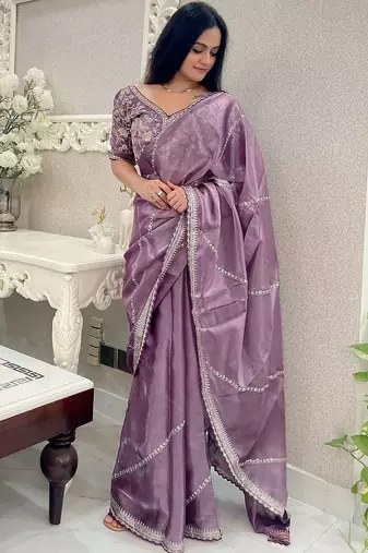 Purple purple striped embroidered organza saree