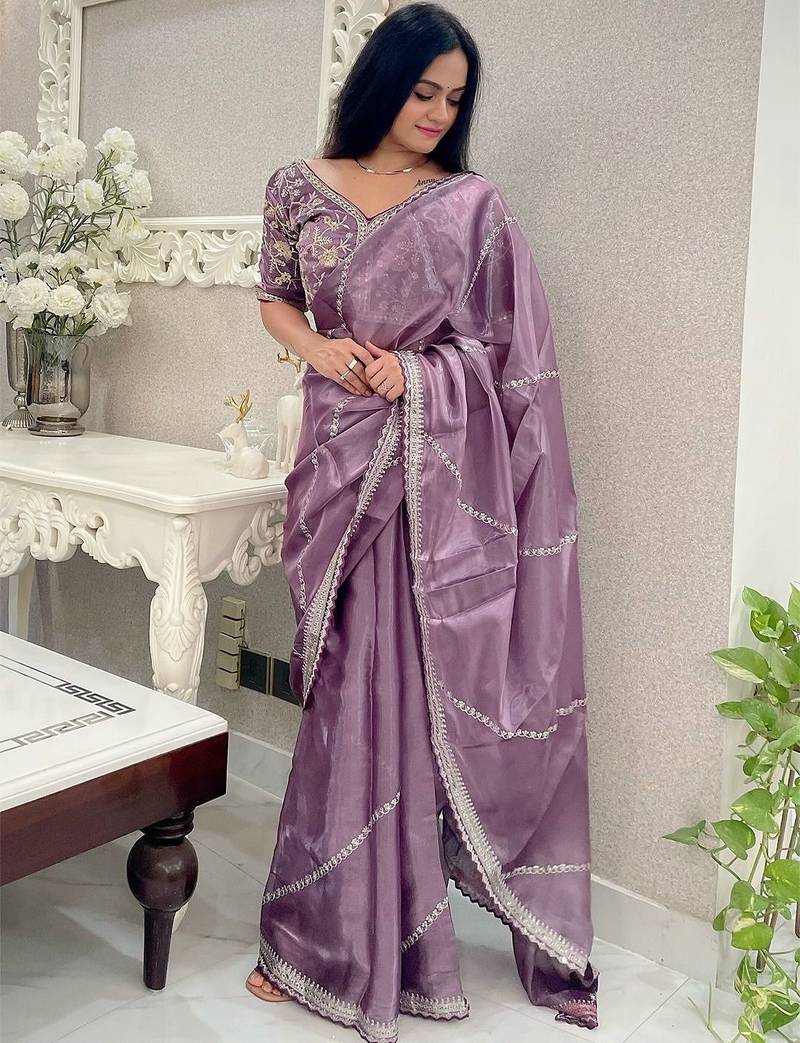 Purple purple striped embroidered organza saree