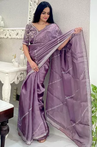 Purple purple striped embroidered organza saree