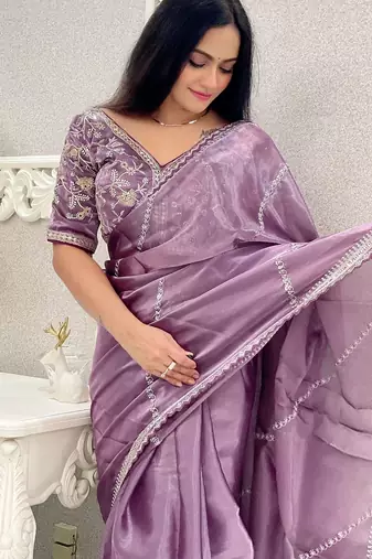 Purple purple striped embroidered organza saree