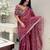 Rust floral embroidered organza saree