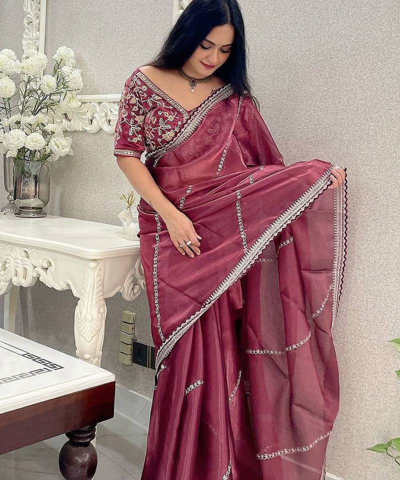 Rust floral embroidered organza saree
