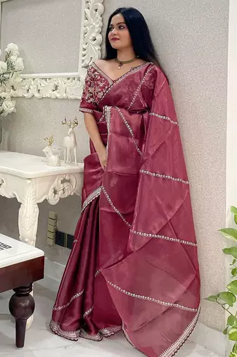 Rust floral embroidered organza saree