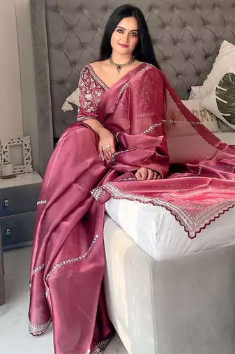 Rust floral embroidered organza saree