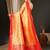 Peach peach-coloured & red ethnic motifs woven design zari kanjeevaram saree