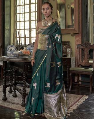 Green woven design zari satin banarasi saree 5