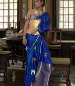 Blue ethnic motifs woven design zari satin banarasi saree