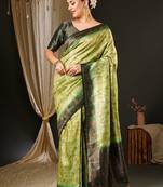 Green ethnic motifs woven design zari kanjeevaram saree