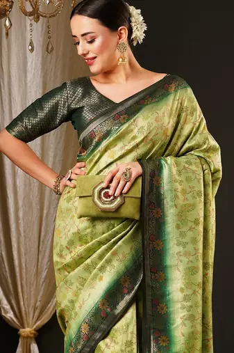 Green ethnic motifs woven design zari kanjeevaram saree