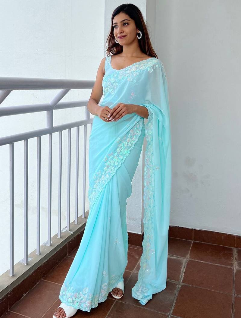 Blue blue ethnic motifs embroidered sequinned  georgette saree