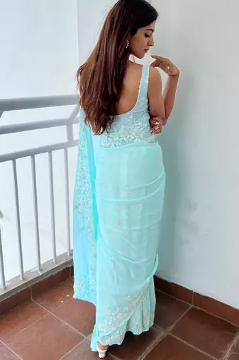 Blue blue ethnic motifs embroidered sequinned  georgette saree