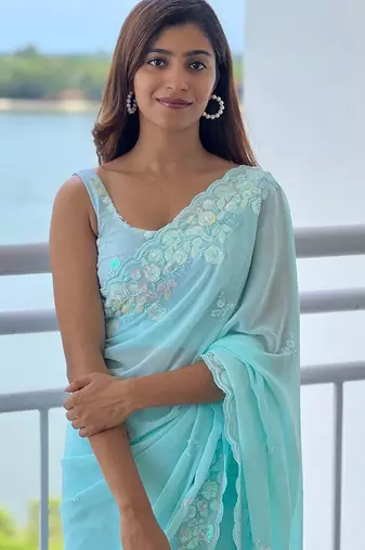Blue blue ethnic motifs embroidered sequinned  georgette saree