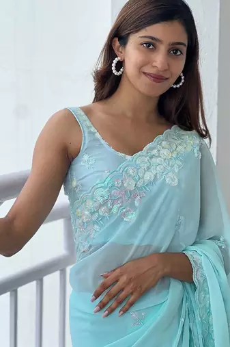 Blue blue ethnic motifs embroidered sequinned  georgette saree