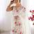 Off white embroidered net saree