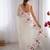 Off white embroidered net saree