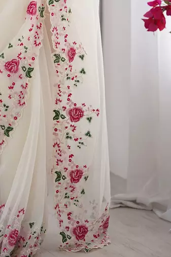 Off white embroidered net saree