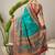 Teal floral printed banarasi saree with matching blouse
