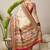 Cream ethnic motifs banarasi saree