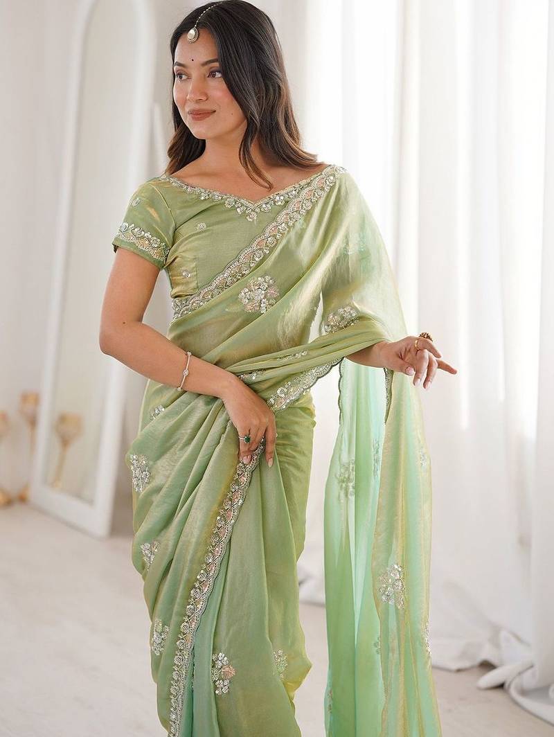 Sea green sea green satin ethnic embellished festive wear matching blouse sarees