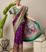 Purple ethnic motifs embroidered silk blend banarasi saree