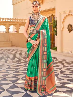 Teal woven design jaali silk blend banarasi saree 1