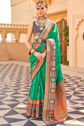Teal woven design jaali silk blend banarasi saree