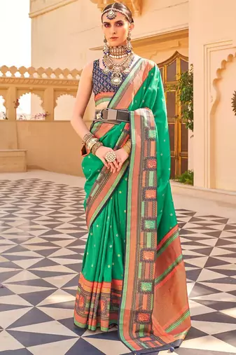 Teal woven design jaali silk blend banarasi saree