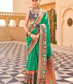 Teal woven design jaali silk blend banarasi saree
