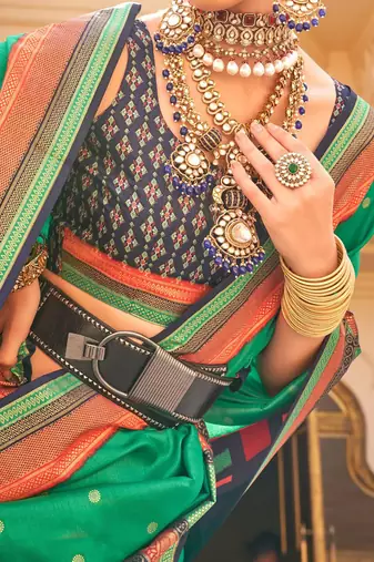 Teal woven design jaali silk blend banarasi saree