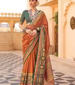 Rust woven design jaali silk blend banarasi saree