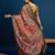 Peach ethnic motifs banarasi saree with unstitched blouse piece