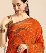 Orange orange woven design  georgette bhagalpuri saree
