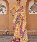 Cream cream & pink leheriya printed zari organza banarasi saree