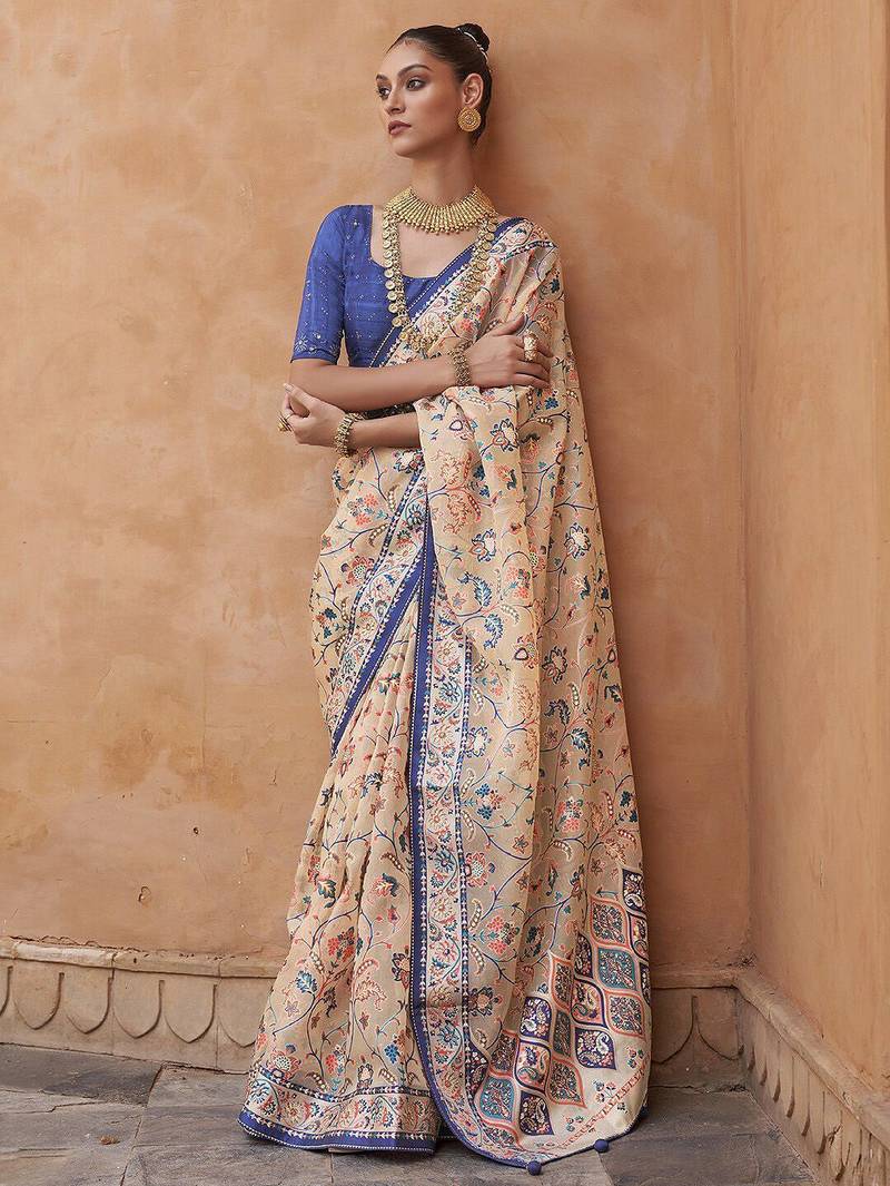 Cream cream & blue ethnic motifs zari organza banarasi saree