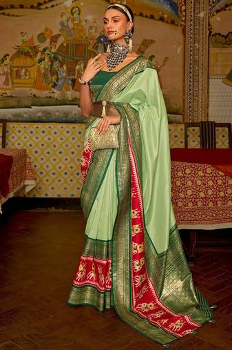 Green green & red ethnic motifs woven design patola saree