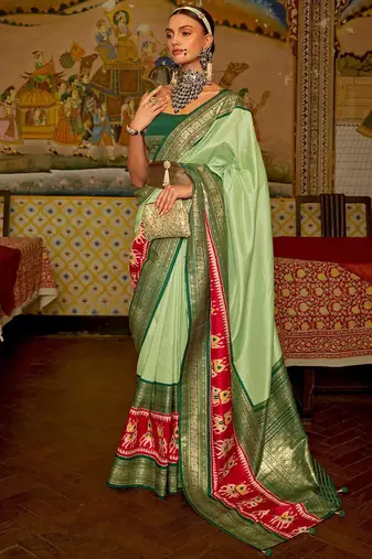 Green green & red ethnic motifs woven design patola saree
