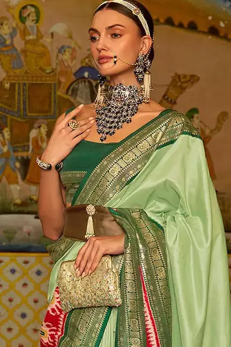Green green & red ethnic motifs woven design patola saree
