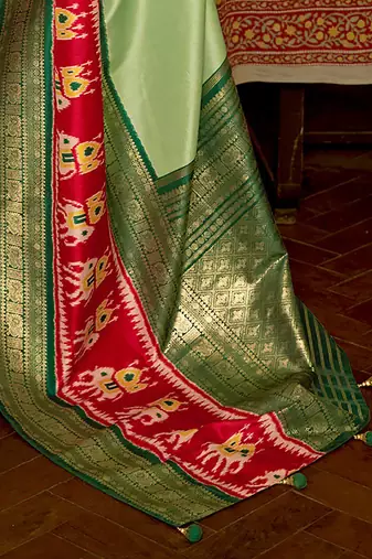 Green green & red ethnic motifs woven design patola saree