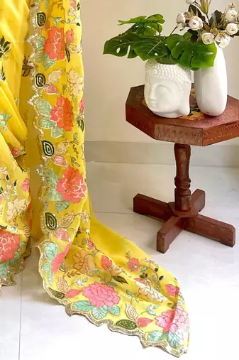Yellow embellished sequinned  georgette saree