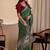 Green embroidered silk blend designer saree