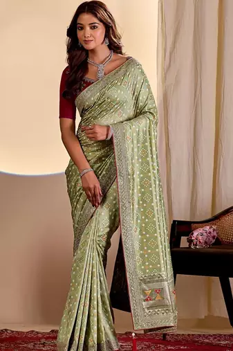 Green bandhani printed embroidered silk blend saree with unstitched blouse piece